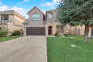 Stunning 4-bedroom, 3-bath home located in a 24-hour gated and on The Golf Club at Resort Eagle Mountain Lake in Texas - for sale on GolfHomes.com, golf home, golf lot