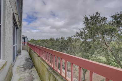 Perched on the top floor of Crystal Bay, this fourth-story condo on Feather Sound Country Club in Florida - for sale on GolfHomes.com, golf home, golf lot