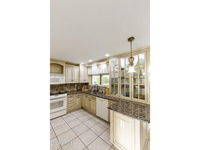 Nicely remodeled home located in the desirable 55+ Fountain of on Fountain of the Sun Country Club in Arizona - for sale on GolfHomes.com, golf home, golf lot