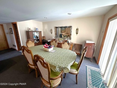 This 4 bedroom, 3 bath Bilevel Residence is located in the on Pocono Farms Country Club in Pennsylvania - for sale on GolfHomes.com, golf home, golf lot