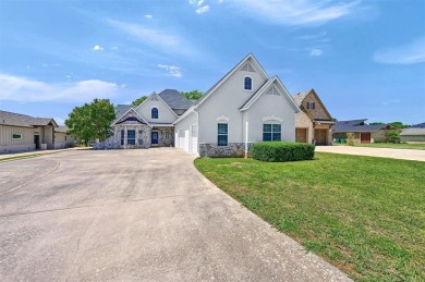 Discover the perfect blend of comfort, elegance, and outdoor on Lake Kiowa Golf Course in Texas - for sale on GolfHomes.com, golf home, golf lot