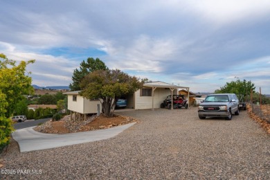 Wonderful mountain & sunset views await in this great property! on Prescott Golf and Country Club in Arizona - for sale on GolfHomes.com, golf home, golf lot