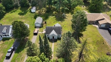Within Hayward's city limits is this great 3-bedroom, 1 bathroom on Hayward Golf and Tennis Club in Wisconsin - for sale on GolfHomes.com, golf home, golf lot