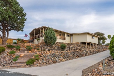 Wonderful mountain & sunset views await in this great property! on Prescott Golf and Country Club in Arizona - for sale on GolfHomes.com, golf home, golf lot