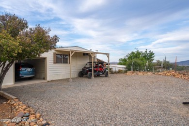 Wonderful mountain & sunset views await in this great property! on Prescott Golf and Country Club in Arizona - for sale on GolfHomes.com, golf home, golf lot