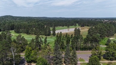 Within Hayward's city limits is this great 3-bedroom, 1 bathroom on Hayward Golf and Tennis Club in Wisconsin - for sale on GolfHomes.com, golf home, golf lot
