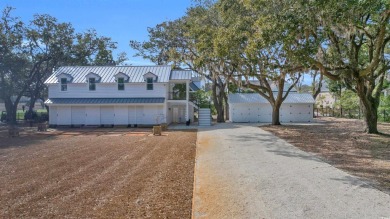 Welcome to 161 Twelve Oaks Drive located within the prestigious on Pawleys Plantation Golf and Country Club in South Carolina - for sale on GolfHomes.com, golf home, golf lot