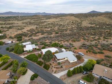 Wonderful mountain & sunset views await in this great property! on Prescott Golf and Country Club in Arizona - for sale on GolfHomes.com, golf home, golf lot