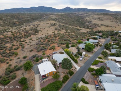 Wonderful mountain & sunset views await in this great property! on Prescott Golf and Country Club in Arizona - for sale on GolfHomes.com, golf home, golf lot
