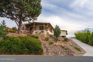 Wonderful mountain & sunset views await in this great property! on Prescott Golf and Country Club in Arizona - for sale on GolfHomes.com, golf home, golf lot