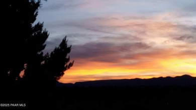 Wonderful mountain & sunset views await in this great property! on Prescott Golf and Country Club in Arizona - for sale on GolfHomes.com, golf home, golf lot
