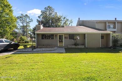 Welcome to 162 Quarterdeck Townes, a single-story townhome with on River Bend Golf and Country Club in North Carolina - for sale on GolfHomes.com, golf home, golf lot