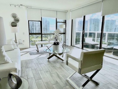This stunning & totally remodeled corner unit with panoramic on Turnberry Isle Resort and Club in Florida - for sale on GolfHomes.com, golf home, golf lot