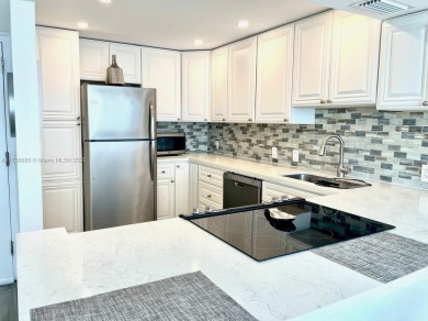 This stunning & totally remodeled corner unit with panoramic on Turnberry Isle Resort and Club in Florida - for sale on GolfHomes.com, golf home, golf lot