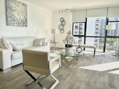 This stunning & totally remodeled corner unit with panoramic on Turnberry Isle Resort and Club in Florida - for sale on GolfHomes.com, golf home, golf lot