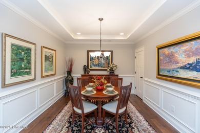 Situated along the fairways of the Woods Golf Course in on Whispering Woods in North Carolina - for sale on GolfHomes.com, golf home, golf lot