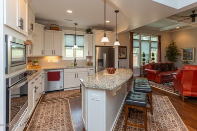 Situated along the fairways of the Woods Golf Course in on Whispering Woods in North Carolina - for sale on GolfHomes.com, golf home, golf lot