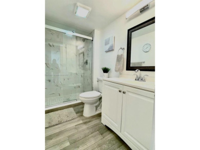 This stunning & totally remodeled corner unit with panoramic on Turnberry Isle Resort and Club in Florida - for sale on GolfHomes.com, golf home, golf lot