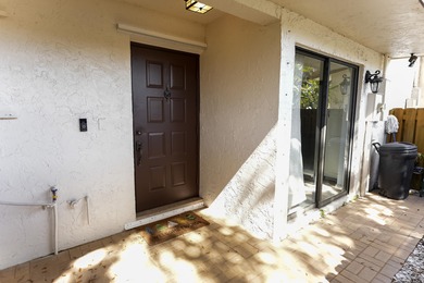 Seller Motivated! Exquisitely remodeled townhome in prestigious on Lago Mar Country Club in Florida - for sale on GolfHomes.com, golf home, golf lot