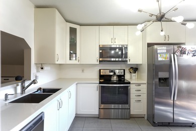 Seller Motivated! Exquisitely remodeled townhome in prestigious on Lago Mar Country Club in Florida - for sale on GolfHomes.com, golf home, golf lot