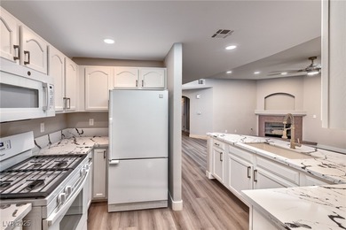 IMMACULATE & FULLY UPGRADED 1ST floor unit inside GUARD GATED on WildHorse Golf Club in Nevada - for sale on GolfHomes.com, golf home, golf lot