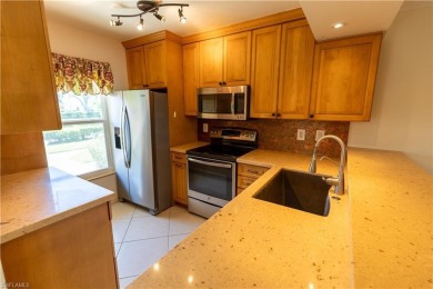 Imagine waking up to the gentle shimmer of morning light dancing on Hammock Bay in Florida - for sale on GolfHomes.com, golf home, golf lot
