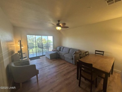 Experience resort-style living in this beautifully updated on London Bridge Golf Course in Arizona - for sale on GolfHomes.com, golf home, golf lot