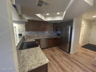Experience resort-style living in this beautifully updated on London Bridge Golf Course in Arizona - for sale on GolfHomes.com, golf home, golf lot
