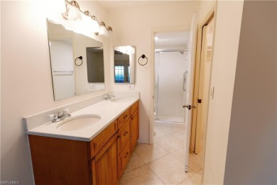 Imagine waking up to the gentle shimmer of morning light dancing on Hammock Bay in Florida - for sale on GolfHomes.com, golf home, golf lot
