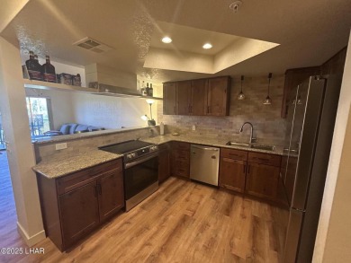Experience resort-style living in this beautifully updated on London Bridge Golf Course in Arizona - for sale on GolfHomes.com, golf home, golf lot