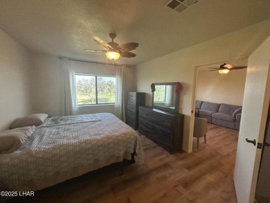Experience resort-style living in this beautifully updated on London Bridge Golf Course in Arizona - for sale on GolfHomes.com, golf home, golf lot