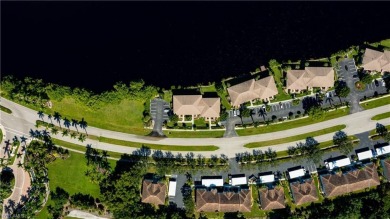 Imagine waking up to the gentle shimmer of morning light dancing on Hammock Bay in Florida - for sale on GolfHomes.com, golf home, golf lot