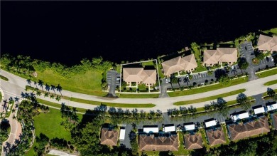 Imagine waking up to the gentle shimmer of morning light dancing on Hammock Bay in Florida - for sale on GolfHomes.com, golf home, golf lot