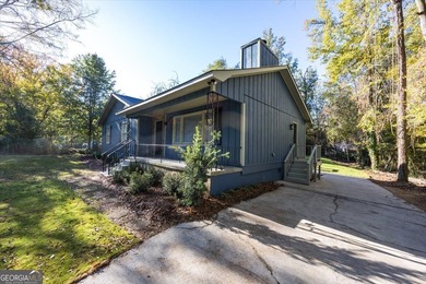 This 4-bedroom, 2-bath home has been completely updated from top on Golf Club of Macon in Georgia - for sale on GolfHomes.com, golf home, golf lot