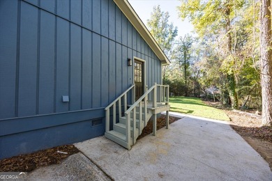 This 4-bedroom, 2-bath home has been completely updated from top on Golf Club of Macon in Georgia - for sale on GolfHomes.com, golf home, golf lot