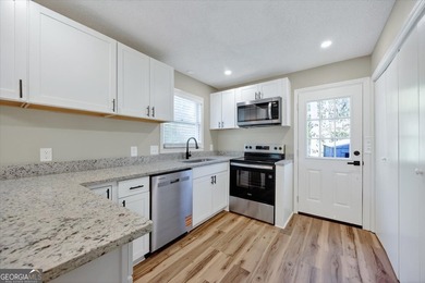 This 4-bedroom, 2-bath home has been completely updated from top on Golf Club of Macon in Georgia - for sale on GolfHomes.com, golf home, golf lot