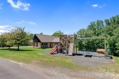 Beautiful mountain feel & custom features! 2.3 acres with a pond on Orchard Hills Golf Course in North Carolina - for sale on GolfHomes.com, golf home, golf lot