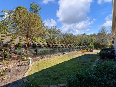 Welcome to one of the most sought-after open-concept designs on Reunion Golf Club in Georgia - for sale on GolfHomes.com, golf home, golf lot