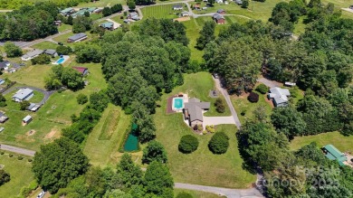 Beautiful mountain feel & custom features! 2.3 acres with a pond on Orchard Hills Golf Course in North Carolina - for sale on GolfHomes.com, golf home, golf lot