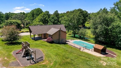 Beautiful mountain feel & custom features! 2.3 acres with a pond on Orchard Hills Golf Course in North Carolina - for sale on GolfHomes.com, golf home, golf lot
