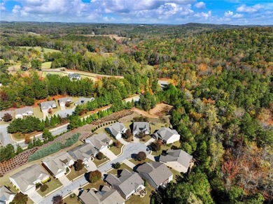 Welcome to one of the most sought-after open-concept designs on Reunion Golf Club in Georgia - for sale on GolfHomes.com, golf home, golf lot