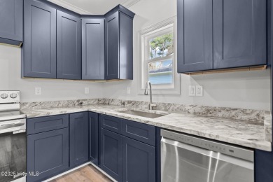 Coastal Luxury Meets Livability at 1552 Windsong Drive in Ocean on Brick Landing Plantation Yacht and Golf Club in North Carolina - for sale on GolfHomes.com, golf home, golf lot