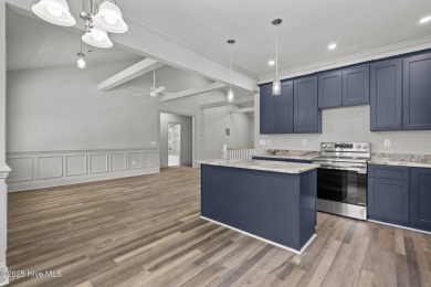 Coastal Luxury Meets Livability at 1552 Windsong Drive in Ocean on Brick Landing Plantation Yacht and Golf Club in North Carolina - for sale on GolfHomes.com, golf home, golf lot