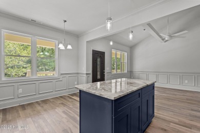 Coastal Luxury Meets Livability at 1552 Windsong Drive in Ocean on Brick Landing Plantation Yacht and Golf Club in North Carolina - for sale on GolfHomes.com, golf home, golf lot