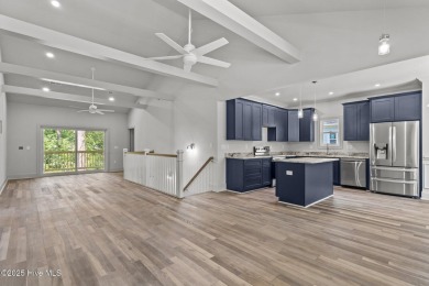 Coastal Luxury Meets Livability at 1552 Windsong Drive in Ocean on Brick Landing Plantation Yacht and Golf Club in North Carolina - for sale on GolfHomes.com, golf home, golf lot