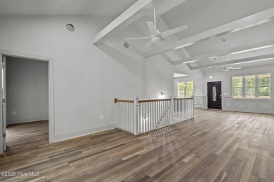 Coastal Luxury Meets Livability at 1552 Windsong Drive in Ocean on Brick Landing Plantation Yacht and Golf Club in North Carolina - for sale on GolfHomes.com, golf home, golf lot