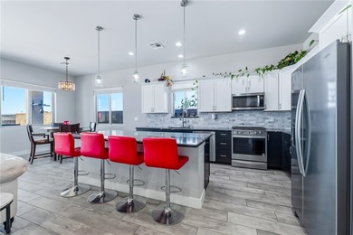 Experience modern resort living in this newer 2024 home, located on Laughlin Ranch Golf Club in Arizona - for sale on GolfHomes.com, golf home, golf lot