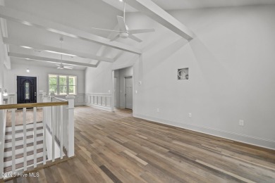 Coastal Luxury Meets Livability at 1552 Windsong Drive in Ocean on Brick Landing Plantation Yacht and Golf Club in North Carolina - for sale on GolfHomes.com, golf home, golf lot