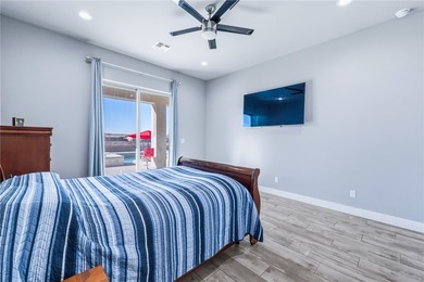 Experience modern resort living in this newer 2024 home, located on Laughlin Ranch Golf Club in Arizona - for sale on GolfHomes.com, golf home, golf lot