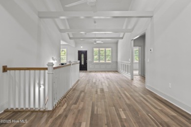 Coastal Luxury Meets Livability at 1552 Windsong Drive in Ocean on Brick Landing Plantation Yacht and Golf Club in North Carolina - for sale on GolfHomes.com, golf home, golf lot